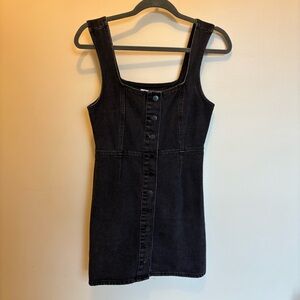 Adorable button-down black denim mini dress from Urban Outfitters